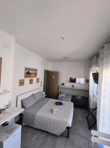 Postel nebo postele na pokoji v ubytování b&b Casa Balai 72 a 100 mt dal mare