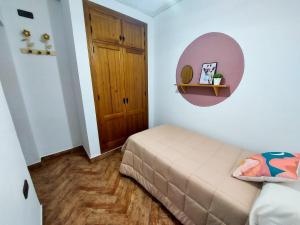 Posteľ alebo postele v izbe v ubytovaní Casa Loli - solo familias y parejas