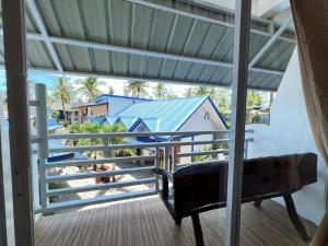 Balkón nebo terasa v ubytování Foxtail Siargao Island Guesthouse