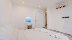 A bed or beds in a room at Villa Zeytouna