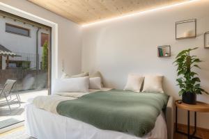 Postel nebo postele na pokoji v ubytování KopfRausch Appartements