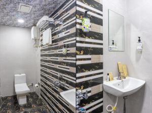 Koupelna v ubytování Treebo Aura Inn Regency