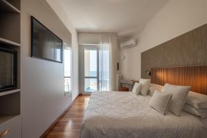 Postel nebo postele na pokoji v ubytování HR Resort