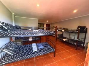Postel nebo postele na pokoji v ubytování Cama Lodge