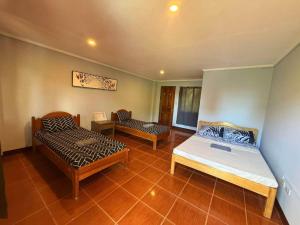 Postel nebo postele na pokoji v ubytování Cama Lodge