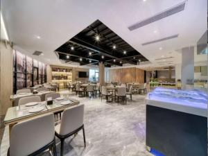 Restoran või mõni muu söögikoht majutusasutuses 唯庭世纪酒店上海静安火车站店