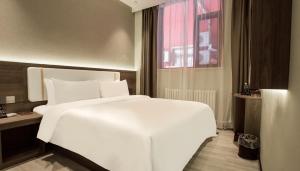 Gallery image of 沃德smart酒店德州火车站店 in Dezhou