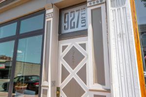 a garage door with a sale sign on it at Monmouth Lofts - Newport Lofts Sleep 10 in Newport
