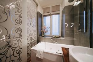 Koupelna v ubytování Hotel Vis à Vis