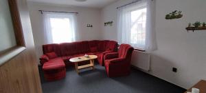 Posezení v ubytování Apartmán pod lesem