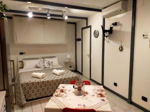 Postel nebo postele na pokoji v ubytování Al Bastione B&B