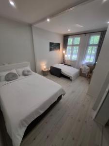 En eller flere senge i et værelse på Pärnu Pikk 24 apartment - Pärnu kesklinn - City center