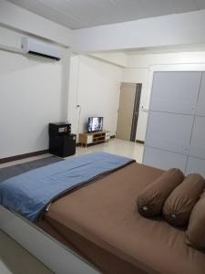 Ένα ή περισσότερα κρεβάτια σε δωμάτιο στο Homey Place 2 +4 φωτογραφίες