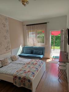 Posteľ alebo postele v izbe v ubytovaní Sunshine apartman