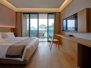 Ruolinqiao Valley Garden Hotel客房内的一张或多张床位