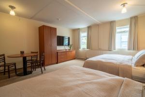 Postel nebo postele na pokoji v ubytování Hotel Vest Mar