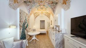 a bathroom with a sink and a toilet in a room at Luxury apartments Banská Bystrica on the main square- LUSSO, FRESCO, PURE in Banská Bystrica