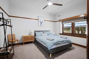 Ένα ή περισσότερα κρεβάτια σε δωμάτιο στο Classic Albury Charm