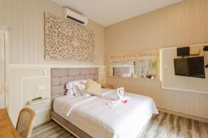 Katil atau katil-katil dalam bilik di Rustic Pandawa Villa +25 gambar