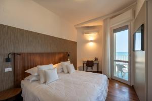 Postel nebo postele na pokoji v ubytování HR Resort