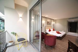 Postel nebo postele na pokoji v ubytování Hotel Seven Stone Bhilwara