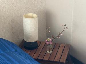 Postel nebo postele na pokoji v ubytování なかじま宿 + 5 fotografií