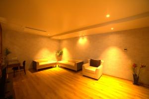 Posezení v ubytování Hotel Seven Stone Bhilwara