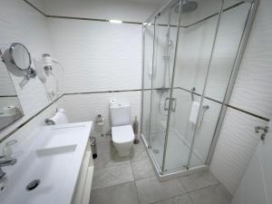 Um banheiro em Holiday Club Playa Amadores