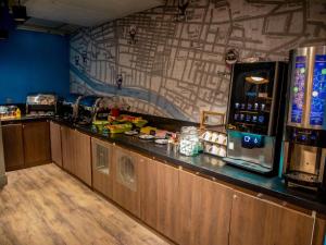 Kuchyň nebo kuchyňský kout v ubytování ibis Styles Glasgow Central