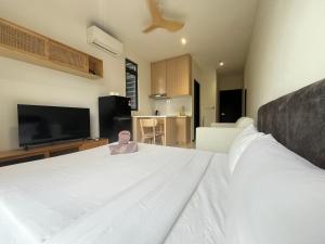 Ένα ή περισσότερα κρεβάτια σε δωμάτιο στο Arte Plus Ampang By Comfortcorner