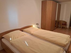 Ein Bett oder Betten in einem Zimmer der Unterkunft Haus Christianenhöhe App 40