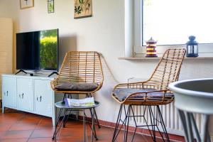 TV a/nebo společenská místnost v ubytování Cora