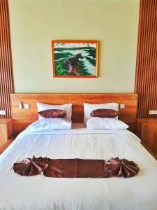 Postel nebo postele na pokoji v ubytování Maya Ocean Resort