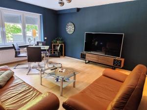 Et tv og/eller underholdning på Ferienwohnung Haus am Wald