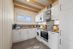 Η κουζίνα ή μικρή κουζίνα στο Ferienhaus Jette Olpenitz
