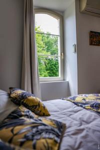 Postel nebo postele na pokoji v ubytování Le Refuge de la Brêche + 17 fotografií