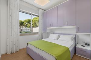 Ένα ή περισσότερα κρεβάτια σε δωμάτιο στο Ca di Valle Retreats