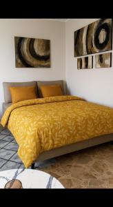 Ένα ή περισσότερα κρεβάτια σε δωμάτιο στο Dagma Spa Home Sicilia