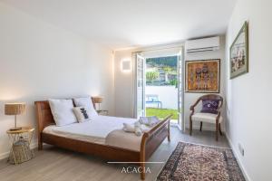 Łóżko lub łóżka w pokoju w obiekcie Villa Olaina - Villa climatisée avec piscine
