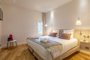 Postel nebo postele na pokoji v ubytování Atalaye - Grand appartement vue mer