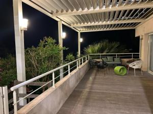 En balkong eller terrasse på Atlantide - Somptueuse Villa Classée 4 étoiles - Saint-Clair - Vue Exceptionnelle - Piscine