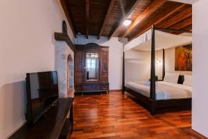 Cama ou camas em um quarto em Zacosta Villa Hotel