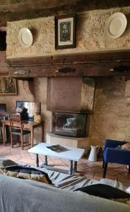 Posedenie v ubytovaní Dans la Cité de Rocamadour L'Oustal de Beline