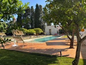 Bazén v ubytování Suite Garden- Palazzo Villani Lubelli nebo v jeho okolí