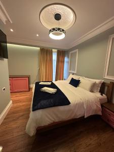 Postel nebo postele na pokoji v ubytování Flored Hotel