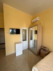 Postel nebo postele na pokoji v ubytování GRANAT Hotel