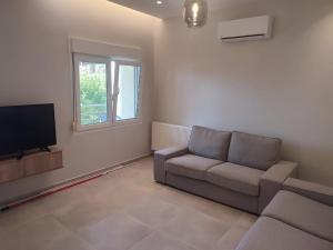 Posezení v ubytování Estrella Rooms