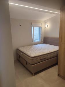 Postel nebo postele na pokoji v ubytování Estrella Rooms