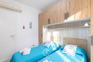 Cama o camas de una habitación en CASA NORA - 500m dal mare Costa Rei