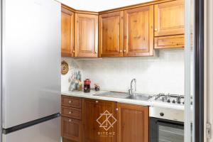 Una cocina o zona de cocina en CASA NORA - 500m dal mare Costa Rei 48 fotos más